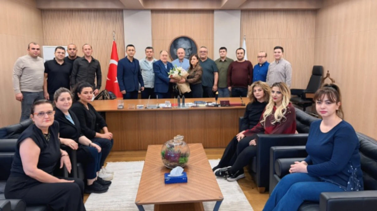 TİCARET ODASI PERSONELİ ARİF PARMAKSIZ'A VEDA ZİYARETİ YAPTI 